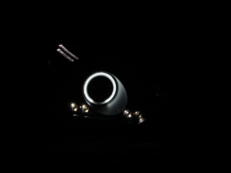 ANZO 2008-2011 Ford Focus Projector Headlight Set with Halo - Black Housing, Clear Lens, Pair