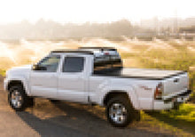 Load image into Gallery viewer, BAK Industries BAKFlip G2 Hard Folding Truck Bed Cover for Nissan Titan 6ft 7in Bed (2004-2015)