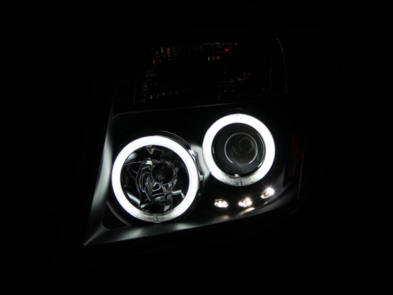 ANZO 2005-2008 Nissan Frontier Projector Headlights with Halo Black Housing, Pair