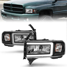 Load image into Gallery viewer, ANZO 94-02 Dodge Ram Crystal Headlight with Light Bar – Black Housing, Pair