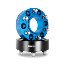 Load image into Gallery viewer, Mishimoto 50mm Wheel Spacers, 6x139.7 Bolt Pattern, 106mm Bore, M12x1.5 - misBNWS-004-500BK