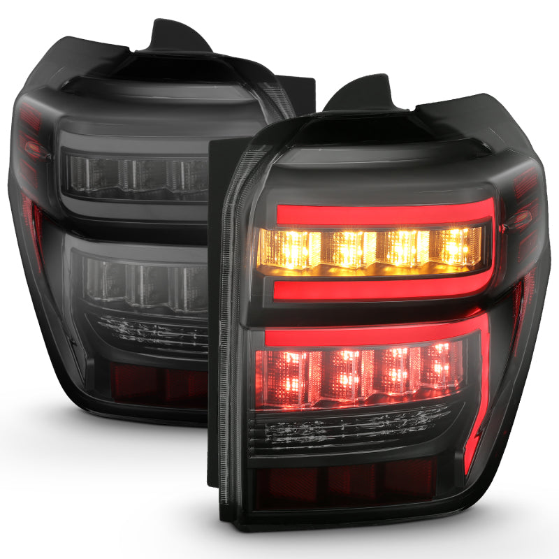 ANZO 2014-2020 Toyota 4Runner Tail Light Assembly with Smoke Lens and Red Light Bar