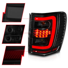 Load image into Gallery viewer, ANZO 1999-2004 Jeep Grand Cherokee LED Tail Light Set with Light Bar and Smoke Lens - Black Housing