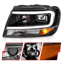 Load image into Gallery viewer, ANZO 99-04 Jeep Grand Cherokee Crystal Headlights with Light Bar, Black Housing, Clear Lens – Pair