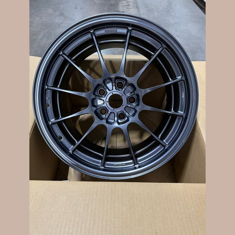 Enkei NT03+M 18x9.5 Inch Gunmetal Alloy Wheel with 5x114.3 Bolt Pattern and 27mm Offset