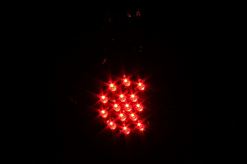 ANZO 2005-2015 Toyota Tacoma LED Tail Light Assembly with Clear Lens and Black Housing