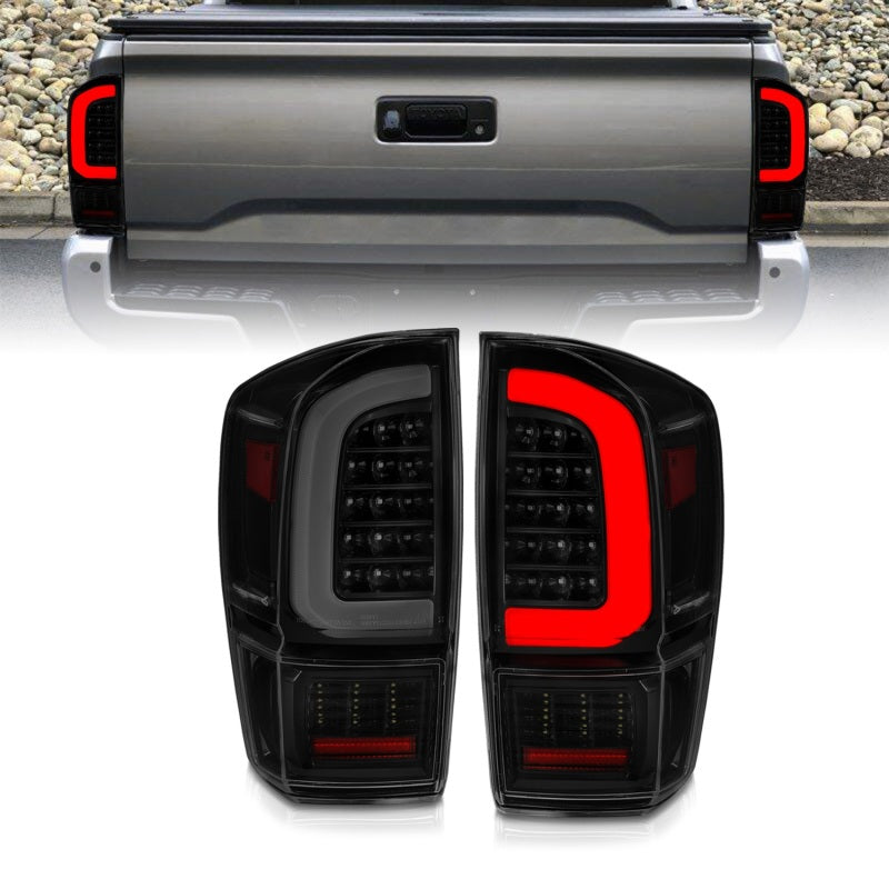 ANZO 16-21 Toyota Tacoma LED Tail Lights with Light Bar, Sequential Turn Signals, Black Housing & Smoke Lens