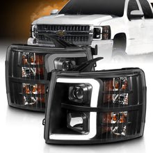 Load image into Gallery viewer, ANZO 07-13 Chevrolet Silverado 2500/3500 Projector Headlights with Clear Lens and Amber Housing, Black Finish