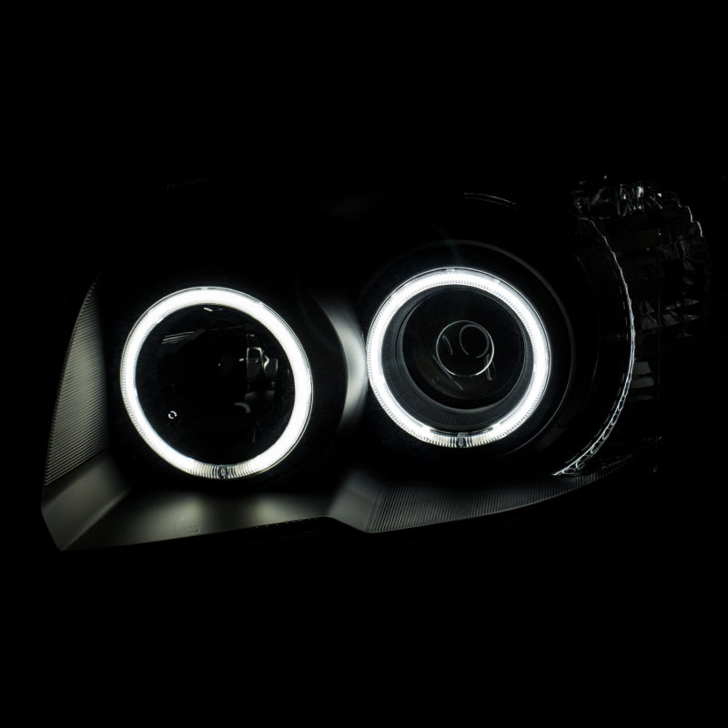 ANZO 2006-2009 Toyota 4Runner Projector Headlights with Halo and Black Housing - Pair