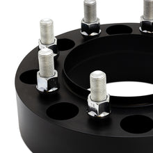 Load image into Gallery viewer, Mishimoto Wheel Spacer Adapters - 8x180 to 8x165.1, 1.5-Inch, Black, Part Number misBNWS-012-381BK