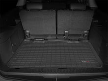Load image into Gallery viewer, WeatherTech Part Number WET40311 Black Cargo Liner for GMC Yukon XL 2500 and Chevrolet Suburban 2500 (2010-2012)