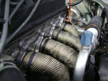 Load image into Gallery viewer, Mishimoto 2 inch x 35 ft Exhaust Heat Wrap with Stainless Locking Ties - Automotive Thermal Insulation for Engine Performance