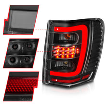 Load image into Gallery viewer, ANZO 1999-2004 Jeep Grand Cherokee LED Tail Light Set with Light Bar, Black Housing &amp; Clear Lens