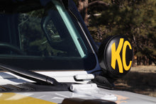 Load image into Gallery viewer, KC HiLiTES 6-inch Round Soft Vinyl Light Covers with Yellow KC Logo - Black