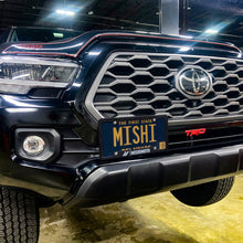 Load image into Gallery viewer, Mishimoto 2016-2023 Toyota Tacoma License Plate Relocation Kit for Improved Cooling and Versatile Installation