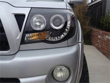 Load image into Gallery viewer, Spyder Toyota Tacoma 2005-2011 Projector Headlights with Halo LED * Black, OEM Quality