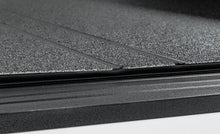Load image into Gallery viewer, Access LOMAX Tri-Fold Hard Tonneau Cover for 2022-2023 Toyota Tundra 5ft 6in Bed with Deck Rail - Black Urethane Finish