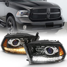Load image into Gallery viewer, ANZO 2009-2018 Dodge Ram Projector Headlights with Halo and Switchback - Black Amber Housing, OE Style Pair
