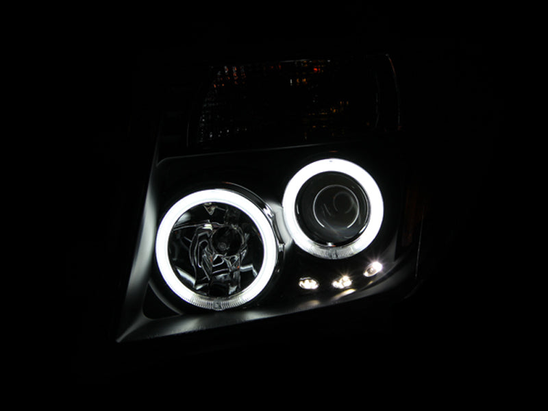 ANZO 2005-2008 Nissan Frontier Projector Headlights with Halo Black Housing, Pair