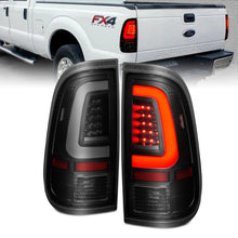 Load image into Gallery viewer, ANZO 2008-2016 Ford F-250 LED Tail Light Assembly with Light Bar, Black Housing and Smoke Lens