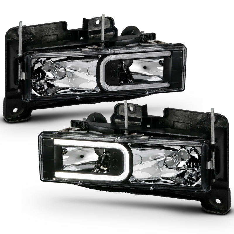 ANZO 1999-2000 Cadillac Escalade Crystal Headlights with LED Light Bar - Black Housing, Clear Lens (Pair)