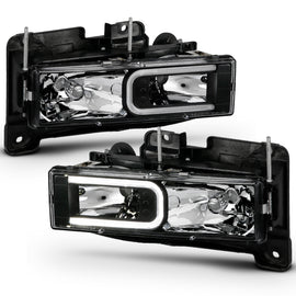 ANZO 1999-2000 Cadillac Escalade Crystal Headlights with LED Light Bar - Black Housing, Clear Lens (Pair)