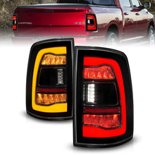Load image into Gallery viewer, ANZO 09-18 Dodge Ram 1500 Sequential LED Tail Lights with Smoke Black Housing and Switchback Amber Signal