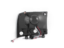 Load image into Gallery viewer, ANZO 2000-2004 Ford Excursion Crystal Headlights with Black Housing and LED Strip