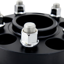 Load image into Gallery viewer, Mishimoto 5x120 Wheel Spacers for Chevrolet Impala – 20mm Thickness, M14x1.5 Studs, Black Anodized Finish