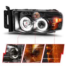 Load image into Gallery viewer, ANZO 2002-2005 Dodge Ram 1500 Projector Headlights with Halo - Black Housing, Clear and Amber Lenses (Pair)