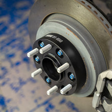 Load image into Gallery viewer, Mishimoto BNWS-019-250BK 25mm Hub-Centric Wheel Spacers, 6x139.7 Bolt Pattern, 77.8mm Center Bore