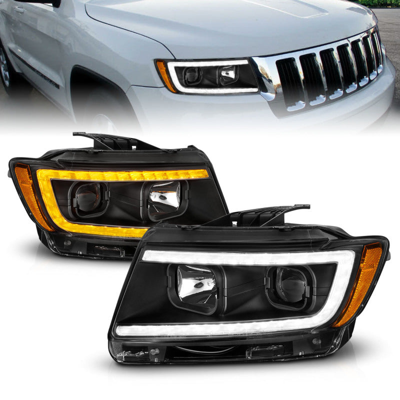 ANZO 11-13 Jeep Grand Cherokee Projector Headlights with Light Bar Switchback, Black Housing