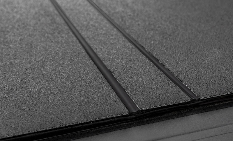 Access LOMAX Tri-Fold Hard Tonneau Cover for 2022-2023 Nissan Frontier 5ft Bed