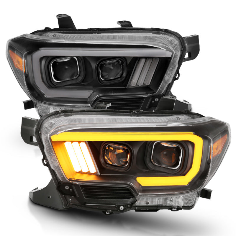 ANZO 2016-2017 Toyota Tacoma Projector Headlights with Plank Style Switchback in Black and Amber
