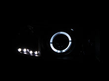 Load image into Gallery viewer, ANZO 1994-2001 Dodge Ram Projector Headlights with Halo — Black Housing, Clear Lens, Pair