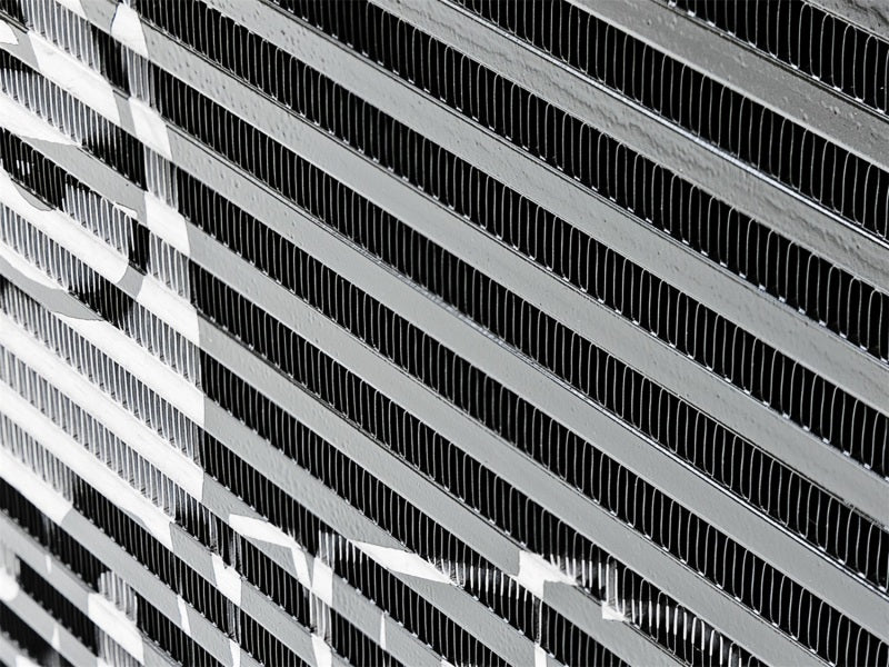 aFe BladeRunner GT Series Bar and Plate Radiator with Black Hoses for Jeep Wrangler (2012-2018) V6 3.6L