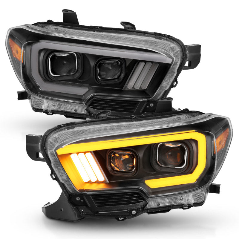 ANZO 2016-2017 Toyota Tacoma Projector Headlights with Plank Style Switchback in Black and Amber with DRL