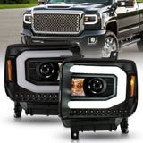 ANZO 2014-2015 GMC Sierra 1500 Projector Headlights with Light Bar, Black Housing - Pair