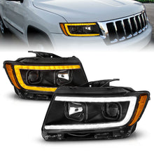 Load image into Gallery viewer, ANZO 11-13 Jeep Grand Cherokee Projector Headlights with Light Bar Switchback, Black Housing
