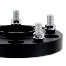 Load image into Gallery viewer, Mishimoto Wheel Spacers, 5x139.7 Bolt Pattern, 77.8mm Hub-Centric, 1/2-20 Thread, Black - misBNWS-016-381BK
