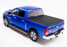 Load image into Gallery viewer, BAK BAKFlip MX4 (GEN 3) Hard Folding Truck Bed Cover for Dodge Ram 1500 with RamBox – Matte Finish, 5' 7" Bed (2010-2014)
