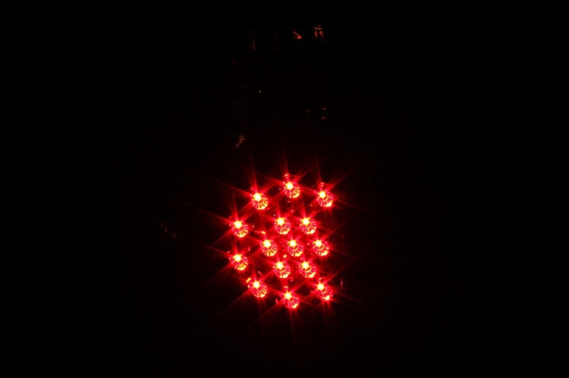 ANZO 2005-2015 Toyota Tacoma LED Tail Light Assembly with Clear Lens and Black Housing