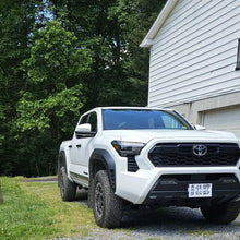 Load image into Gallery viewer, Rally Armor 24-25 Toyota Tacoma Gen 4 Black UR Mud Flap with Metallic Black Logo (Part #ralMF114-UR-BLK-MBK)