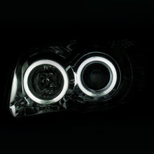 Load image into Gallery viewer, ANZO 2006-2009 Toyota 4Runner Projector Headlights with Halo - Chrome Housing, Clear Lens, Pair